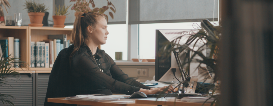 Young professional woman in office environment
